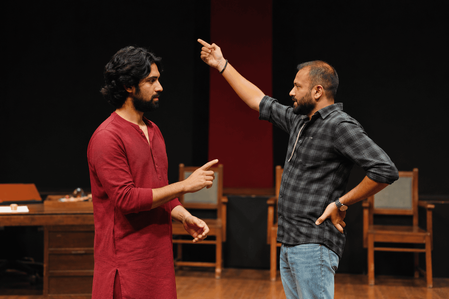 Actors practicing an ensemble exercise during in-person acting training